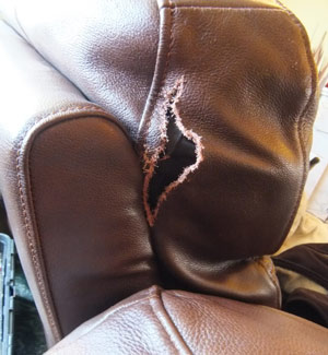 Tear in Leather Before 